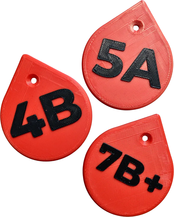 Red grade tags marked 4B, 5A and 7B+